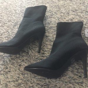 New black slip-on boots with 4" heel